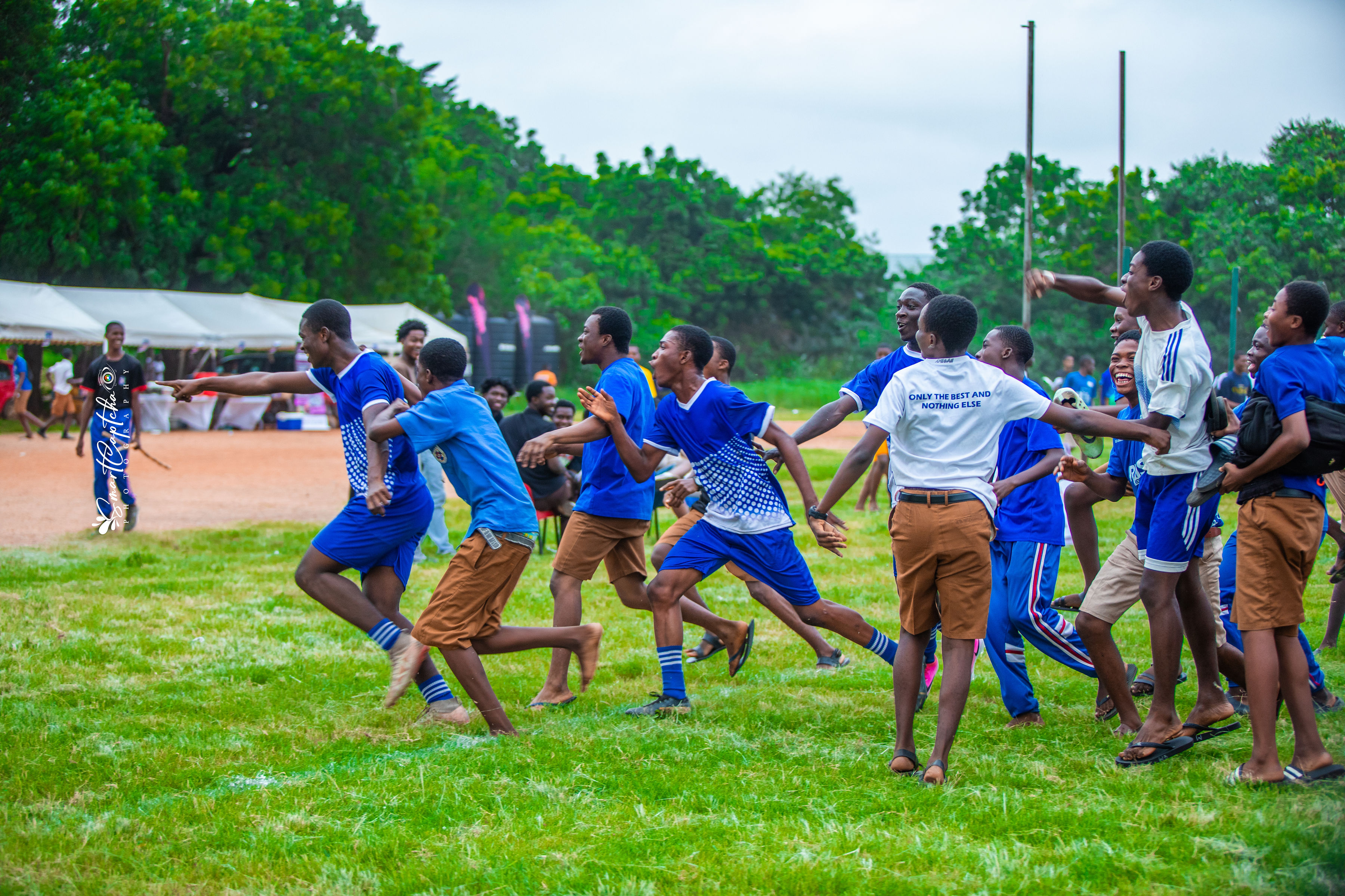 Prestige Football League team and partners on the field